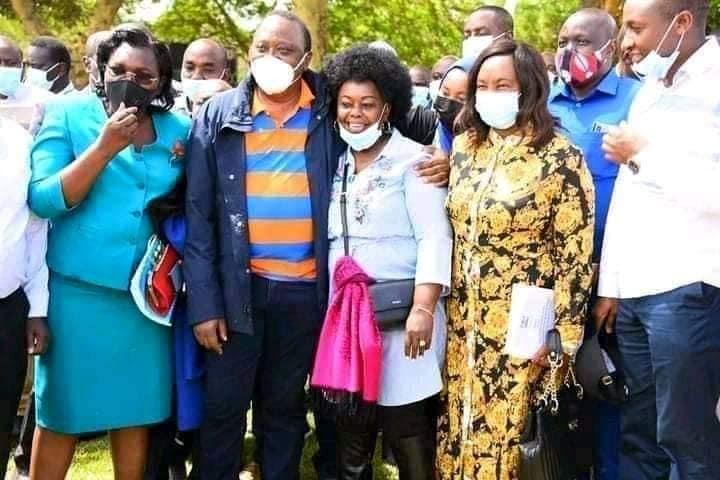 President Uhuru Kenyatta and Millie Odhiambo 