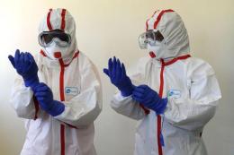 Medics working in a coronavirus lab. 