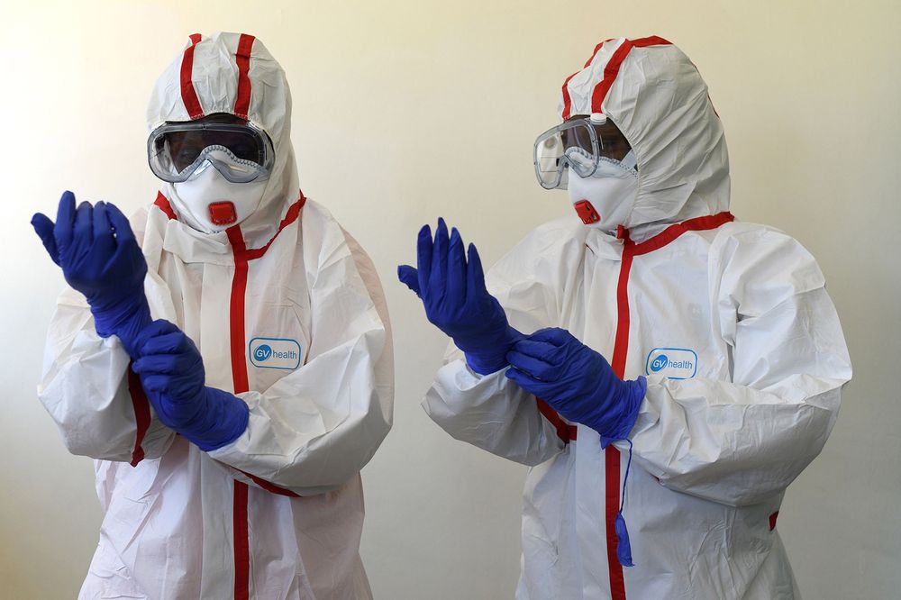 Medics working in a coronavirus lab. 