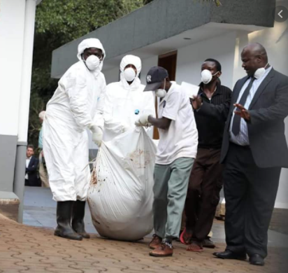 Dead body being removed from crime scene
