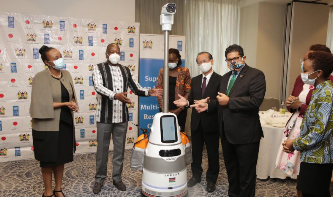 Health CS Mutahi Kagwe and UNDP Resident Representative for Kenya Walid  Badawi during the launch of the Smart Anti-Epidemic Robots in Kenya 