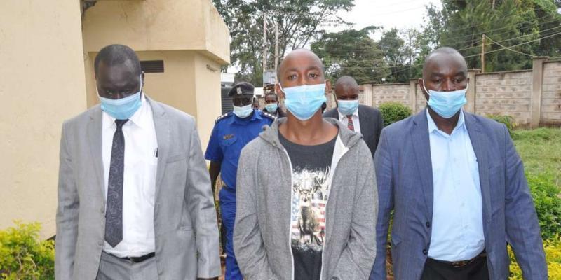 Lawrence Warunge escorted out of the Kiambu Law Courts on January 26, 2021.