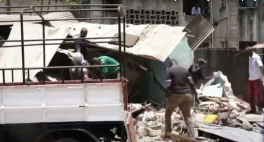 Residents salvage their properties from demolished houses in Buxton Estate, Mombasa County on March 5, 2021.