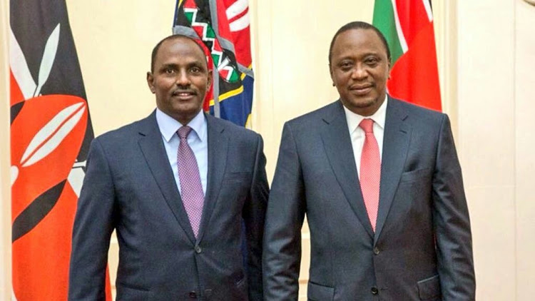 File image of President Uhuru Kenyatta and Treasury CS Ukur Yatani (left). |Photo| Courtesy|