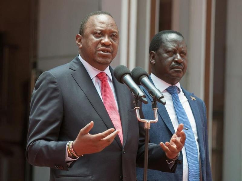 President Uhuru Kenyatta and his handshake partner Raila Odinga. [Photo: Courtesy]