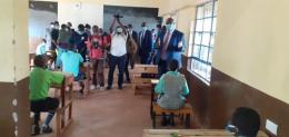 Education PS Julius Jwan (right) inspects a school during the KCPE exams. |Photo| Courtesy|