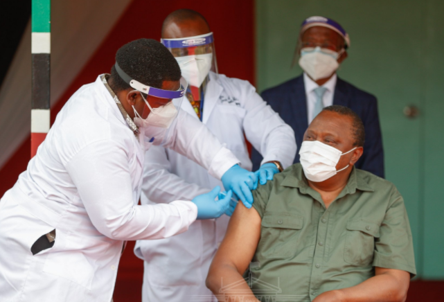 President Uhuru Kenyatta takes Covid-19 vaccine at State House on March 26, 2021.