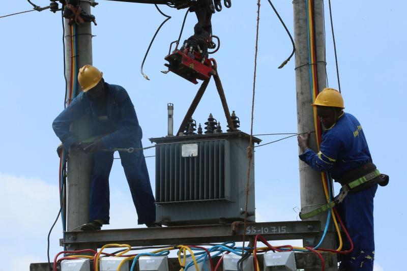 KPLC technicians repair a transformer. |Photo| Courtesy|