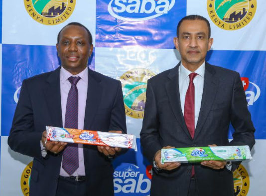 Golden Africa’s Chairman Mr. Fathi Saeed poses with Industry Principal Secretary Amb. Kirimi P. Kaberia at the launch event.