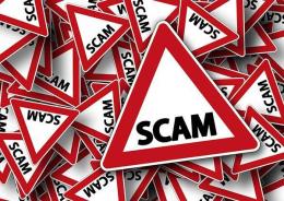 A file image of triangle signs showing scam alert.
