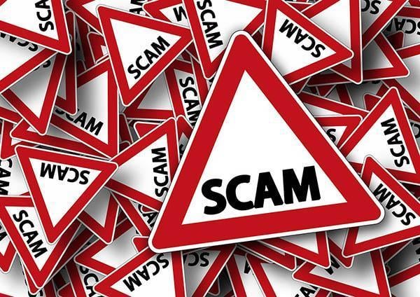 A file image of triangle signs showing scam alert.