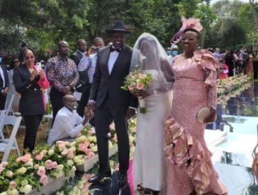 Deputy President William Ruto and his wife Rachel Ruto walking their daughter June down the aisle.