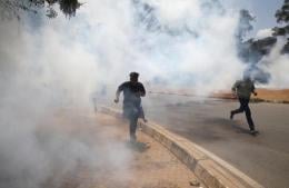 People Running after police fired tear gas