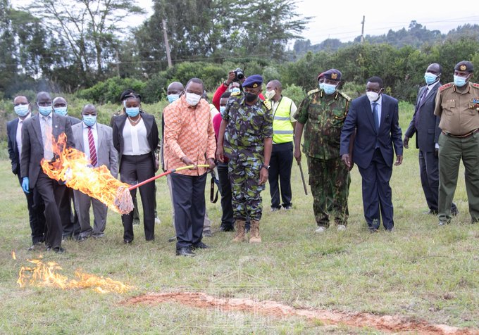 President Uhuru Kenyatta sets fire to illegal firearms
