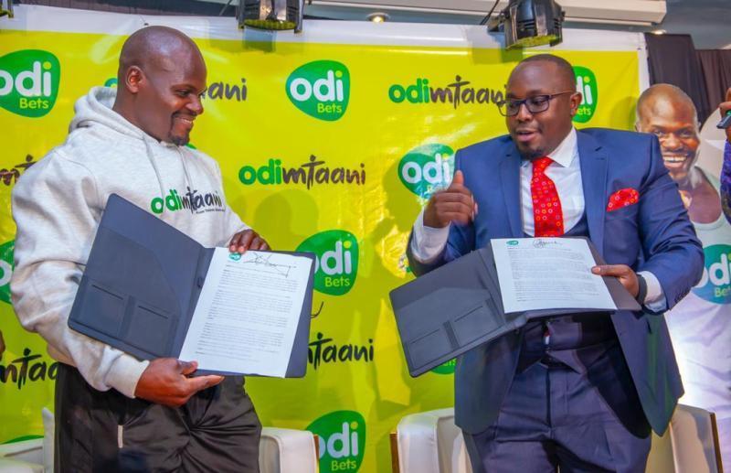 File Image of Charles Odongo popularly known as #UgaliMan and Odibets General manager Dedan Mungai. 
