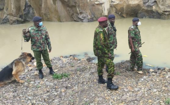 GSU officers during a search for the missing officer at a quarry in Mwiki. 