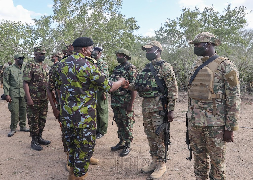 File image of President Uhuru Kenyatta with KDF soldiers at Boni Forest. |Photo| Courtesy|