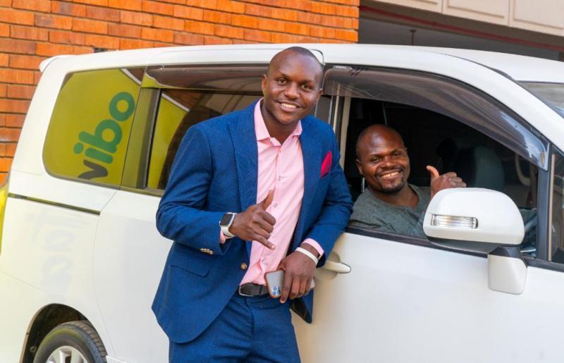 Charles Odongo, popularly known as #UgaliMan with Aggrey Sayi, Odibets Marketing Manager. 