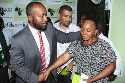 Mombasa Governor Hassan Joho and Mvita MP Abdulswamad Nassir comfort Ruth Syombua after the death of her son Tony Katana. |Photo| Courtesy|