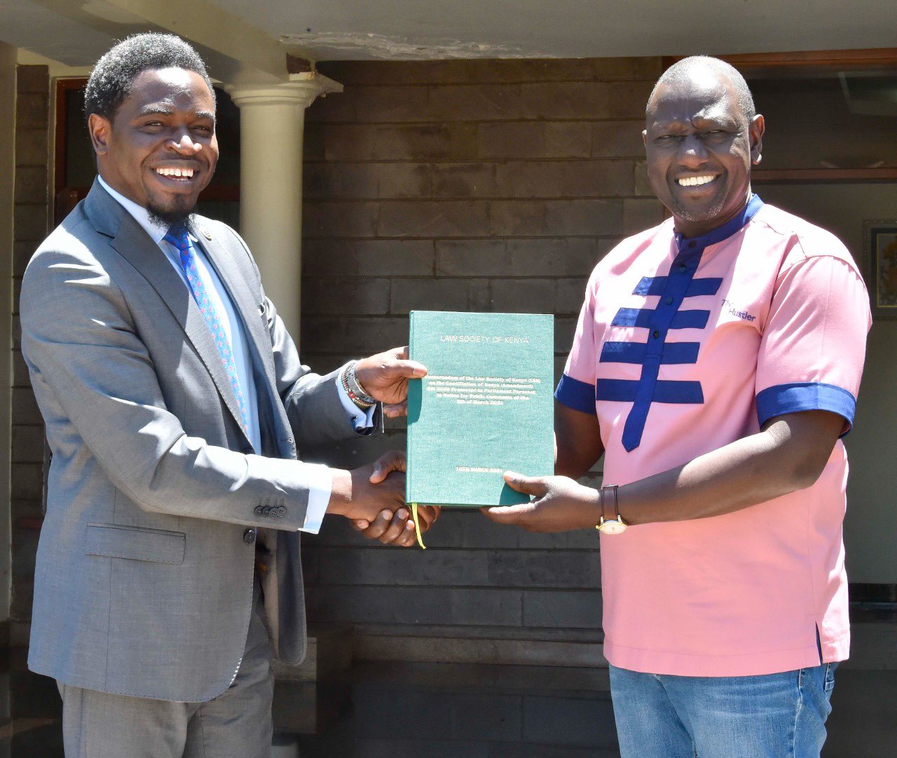 Deputy President William Ruto receives a copy of the memorandum sent to parliament in defence of the Constitution from LSK President Nelson Havi on August 27, 2021. |Courtesy| Twitter|