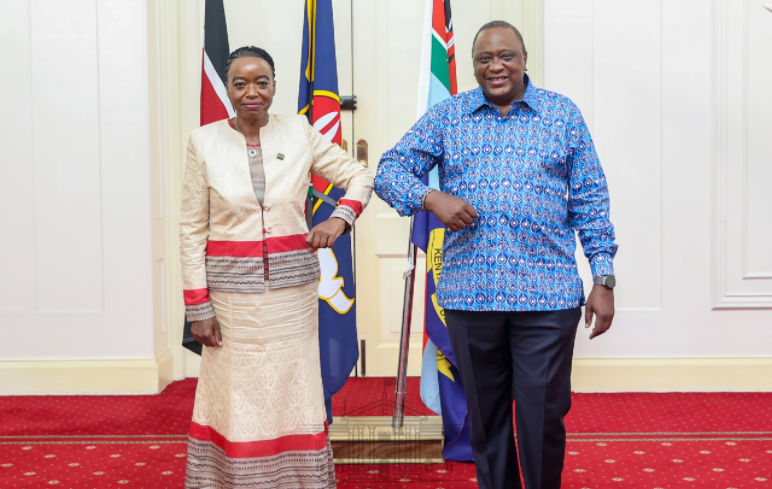 President Uhuru Kenyatta with CS Monica Juma
