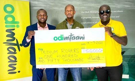Odibets marketing manager Aggrey Sayi (left), Tedium Rodgers and Fred Arocho.