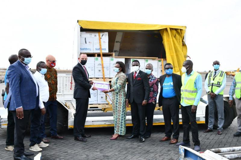 PS Susan Mochache receiving the first batch of Pfizer vaccine at JKIA