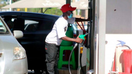 File image of an attendant at a fuel station. 