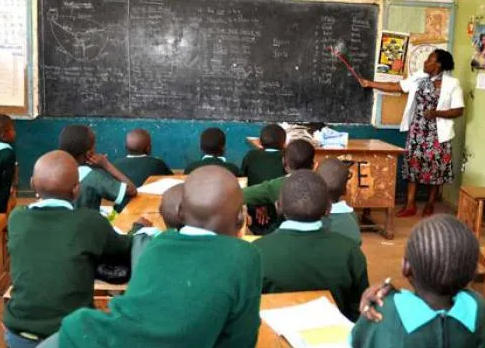File image of A teacher and students inside a classroom. (Courtesy)