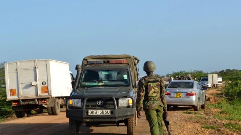 Kenyan police officer along a busy road. |Photo| Courtesy|