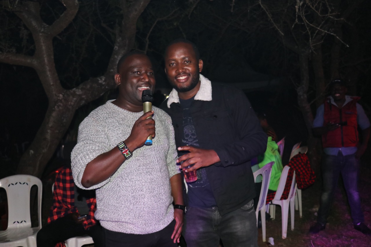 BBC journalist Roncliffe Odit, who is the President of Scribes254 and a colleague during the party. 
