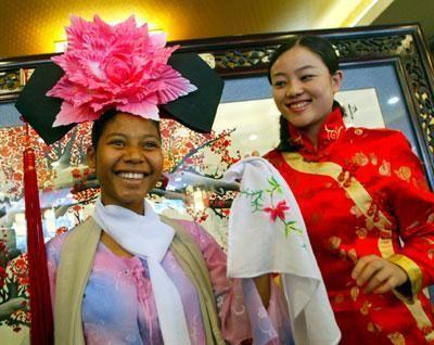 Mwamaka Sharifu (centre) during her graduation in China in 2012. |Photo| Courtesy|