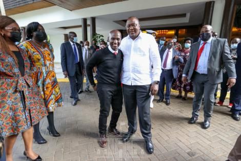 File image of President Uhuru Kenyatta and David Owira 'Otonglo'. |Photo| Courtesy|