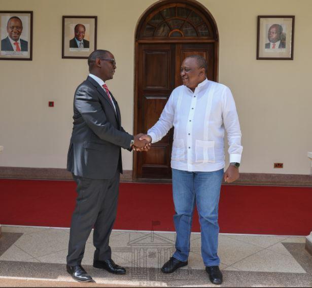 President Uhuru Kenyatta and outgoing State House Chief of Staff Mr Nzioka Waita. 