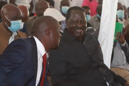 Dennis Onsarigo and ODM leader Raila Odinga.