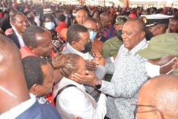 Wangui Ngirici and President Uhuru Kenyatta. 