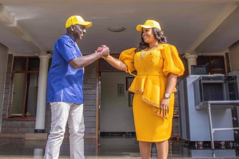 Deputy president William Ruto and Laikipia Woman Rep Cate Waruguru. 