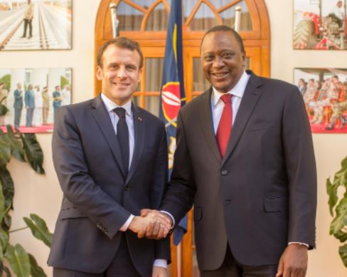 File image of President Uhuru Kenyatta and his France counterpart Emmanuel Macron. 