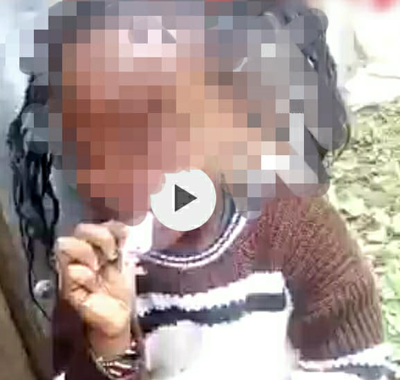 Screengrab of minor smoking bhang. 