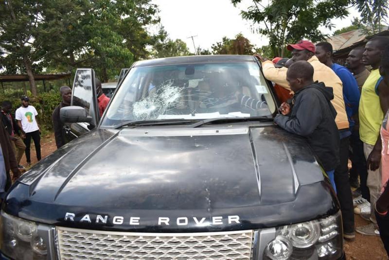 Nicholas Gumbo's convoy pelted with stones. 
