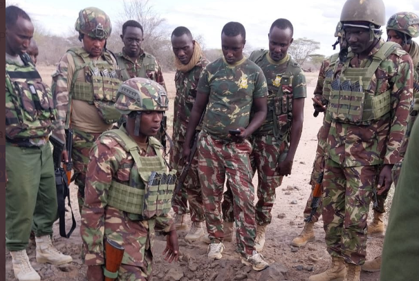 Security officers at the scene of the IED explosion.  