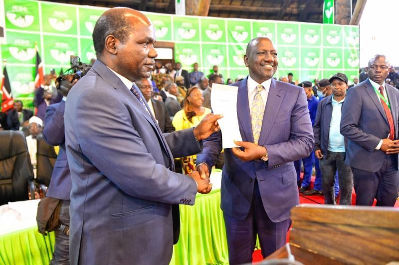President William Ruto and IEBC Chair Wafula Chebukati.