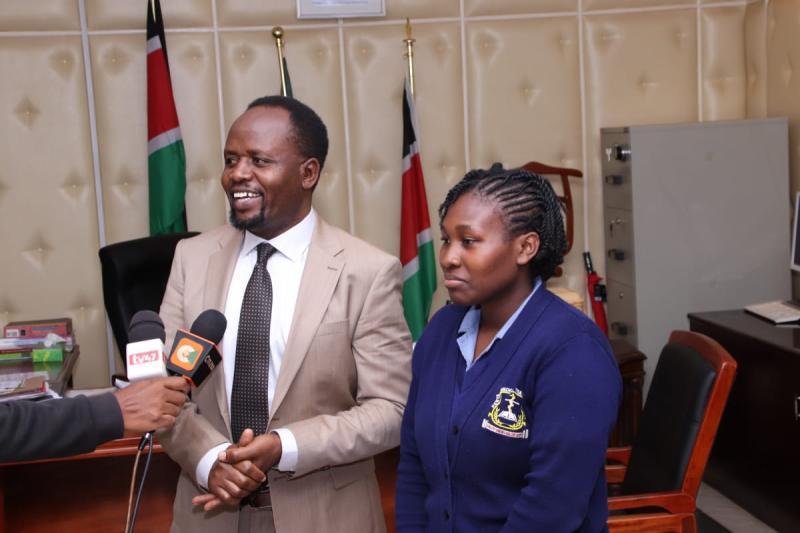 Governor George Natembeya and nurse Elizabeth Robai Lukelesia.