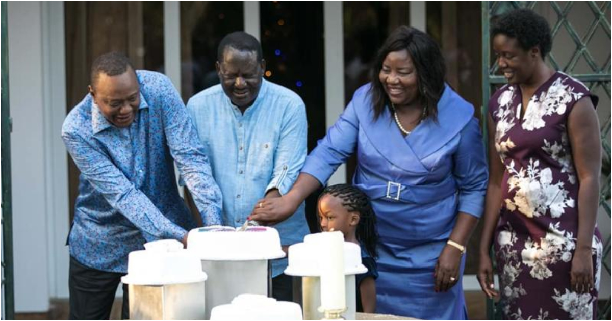 Former president Uhuru Kenyatta partaking in a cake with Raila Odinga, Ida Odinga, and their daughter Rosemary.