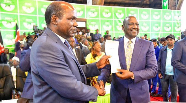 File image of President William Ruto and IEBC chair Wafula Chebukati.