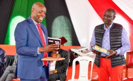 File image of President William Ruto and CS Ezekile Machogu.
