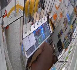 Screengrab of video of daring robbers raiding an M-Pesa shop