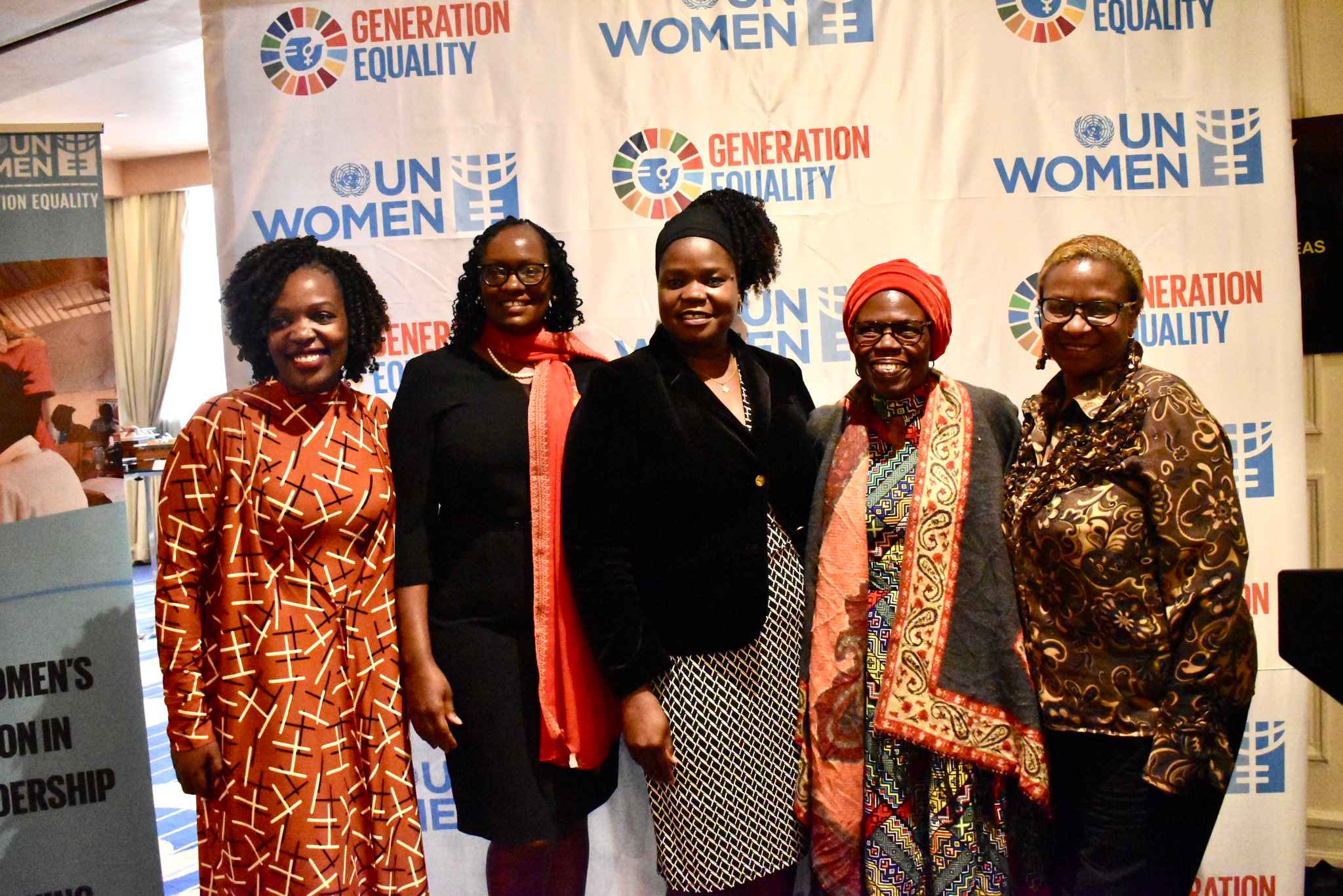 UN Women country Rep Anna Mutavati (middle) poses for a photo with editors at the launch of the strategic note 2023 - 2026.
