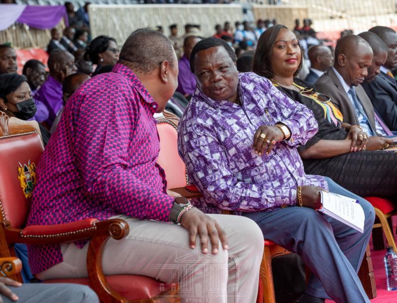 File image of Francis Atwoli and Uhuru Kenyatta.
