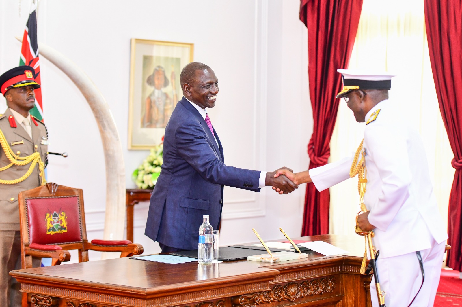 President William Ruto with the Director General of Kenya Coast Guard Bruno Shioso at State House.